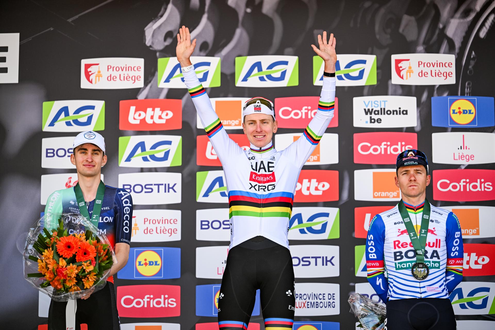 French Paul Seixas of Decathlon CMA CGM Team, Slovenian Tadej Pogacar of UAE Team Emirates-XRG and Belgian Remco Evenepoel of Red Bull-BORA-hansgrohe pictured on the podium after the men elite race of the Liege-Bastogne-Liege UCI World Tour one day cycling race, 259,5km from Liege, over Bastogne to Liege, Sunday 26 April 2026. BELGA PHOTO MAARTEN STRAETEMANS