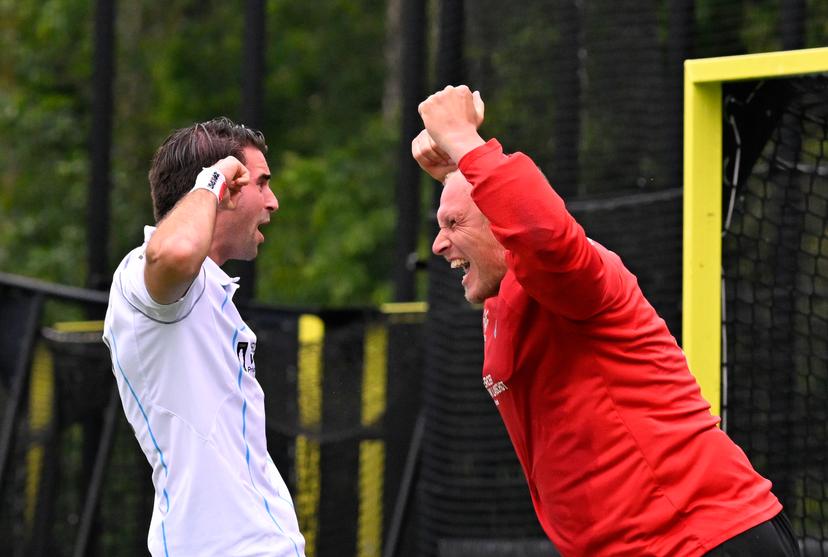 Braxgata's goalkeeper Pirmin Blaak and Braxgata's Marc Reyne celebrate after winning a hockey game between Braxgata and Gantoise, Sunday 17 May 2026 in Boom, the return leg of the Semi Finals of the Belgian first division hockey championship. BELGA PHOTO JOHN THYS