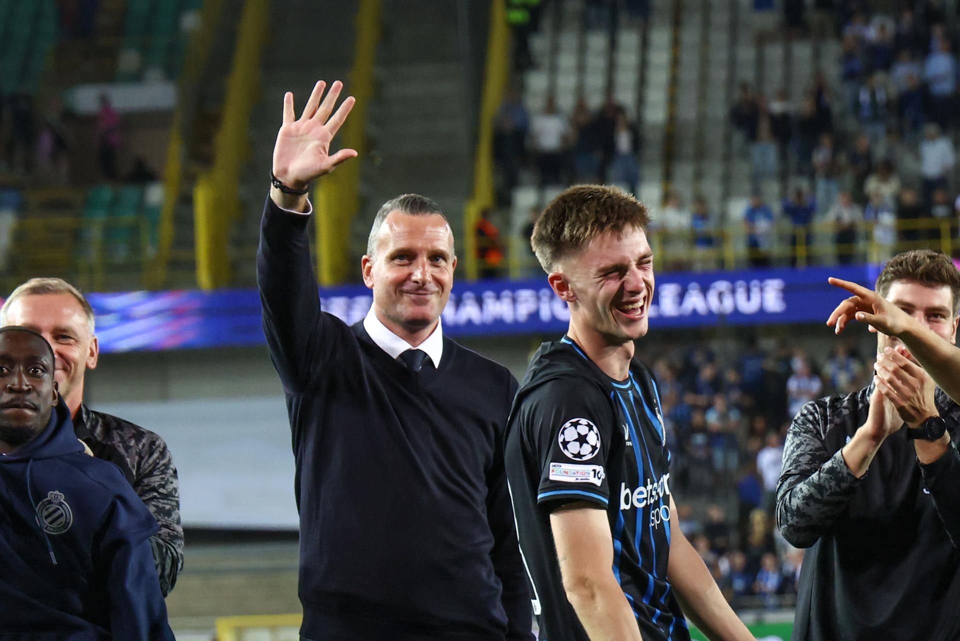 Club's head coach Nicky Hayen and Club's Jorne Spileers celebrate after a soccer game between Belgian Club Brugge KV and Scottish Glasgow Rangers F.C., Wednesday 27 August 2025 in Brugge, the return leg of the play-offs for the Champions League tournament. Club won the first leg 1-3. BELGA PHOTO BRUNO FAHY