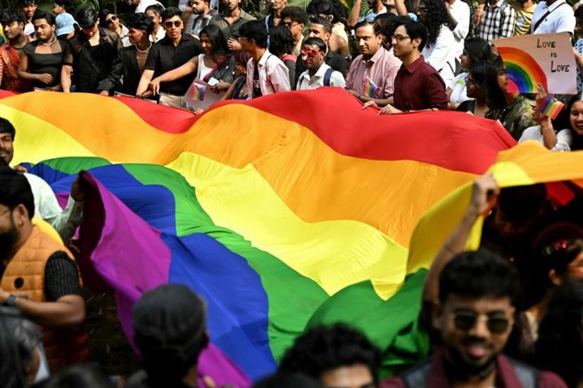 Activists and supporters of the LGBTQ community participate in the 'Pride Walk Bengaluru', a solidarity march held in Bengaluru on December 7, 2025.  Idrees MOHAMMED / AFP