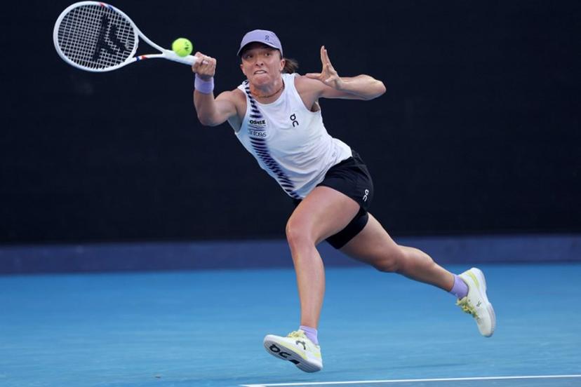 Poland's Iga Swiatek hits a return to Australia's Maddison Inglis during their women's singles match on day nine of the Australian Open tennis tournament in Melbourne on January 26, 2026.  Martin KEEP / AFP