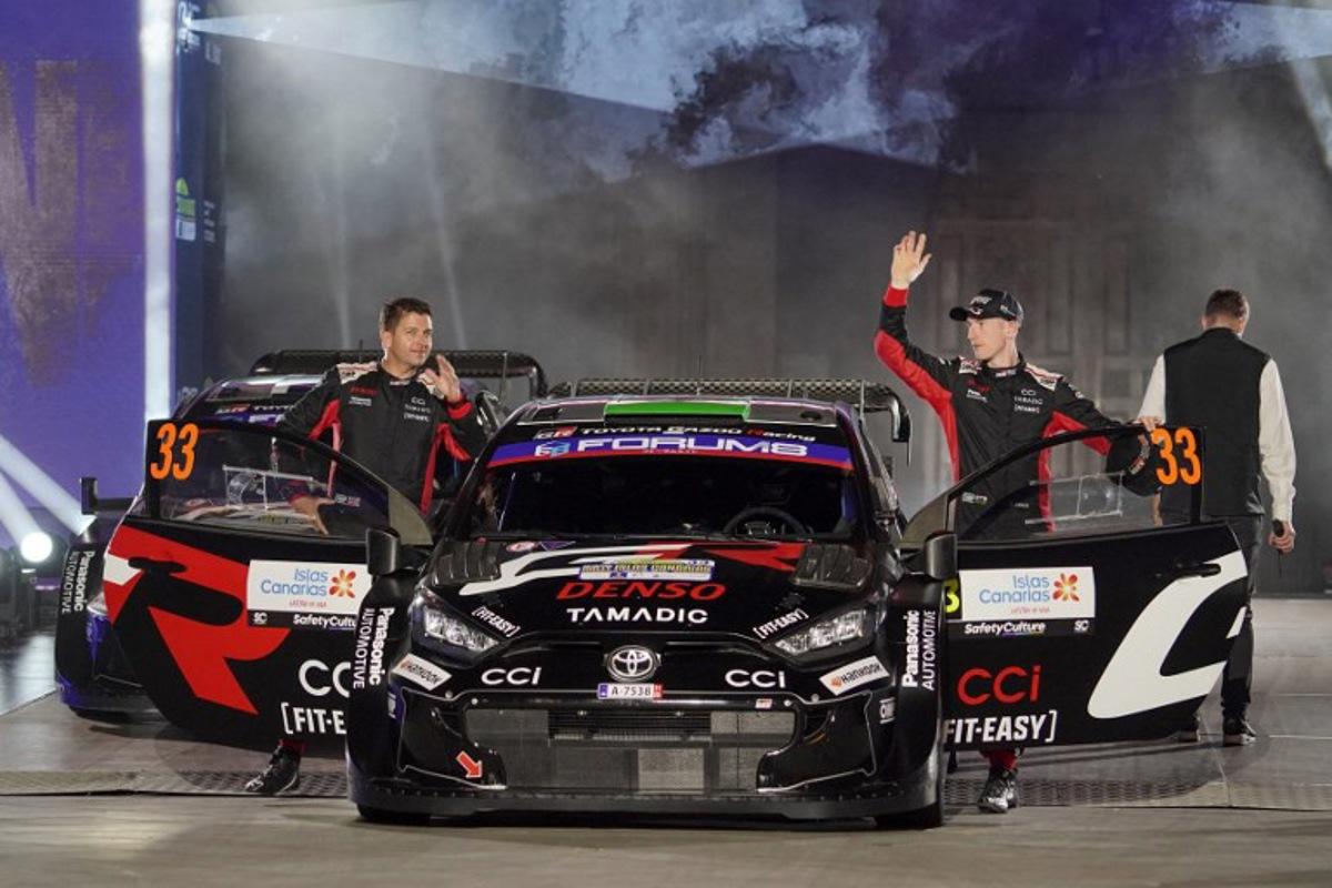 Elfyn Evans of Great Britain and his co-driver Scott Martin of Great Britain of team Toyota Gazoo Racing WRT attend the opening ceremony of the World Rally Championship (WRC) Rally Islas Canarias in Las Palmas in Spain's Canary Islands, on April 24, 2025.  Manaure QUINTERO / AFP