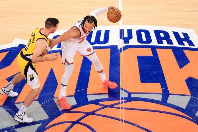 Knicks' point guard #11 Jalen Brunson (R) dribbles the ball under pressure from the Pacers' point guard #09 TJ McConnell (L) during Game Five of the Eastern Conference Finals of the 2025 NBA Playoffs between the New York Knicks and the Indiana Pacers at Madison Square Garden in New York on May 29, 2025.  CHARLY TRIBALLEAU / AFP