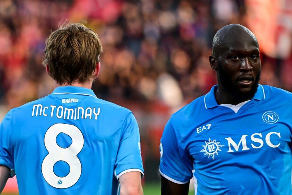 Napoli's Scottish midfielder #8 Scott McTominay (L) celebrates with Napoli's Belgian forward #11 Romelu Lukaku after scoring his team first goal during the Italian Serie A football match between AC Monza and Napoli SSC at the Brianteo Stadium in Monza, northern Italy, on April 19, 2025.  Piero CRUCIATTI / AFP