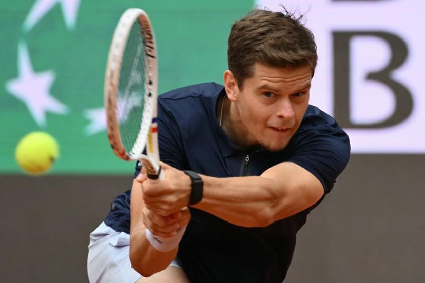 Belgium's Alexander Blockx hits a return to Germany's Alexander Zverev during their men's singles match at the ATP Rome Open tennis tournament at Foro Italico in Rome on May 10, 2026.   Alberto PIZZOLI / AFP