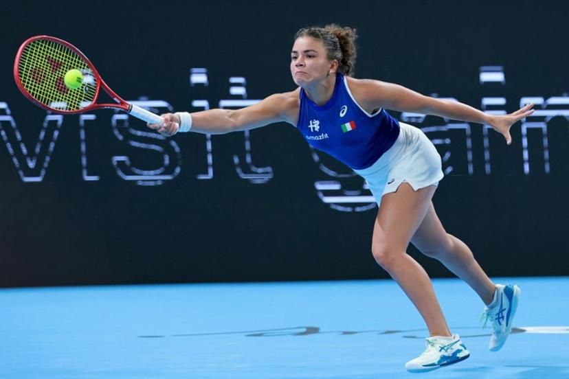 Italy's Jasmine Paolini hits a return to China's Zheng Qinwen during their women's singles quarter-final match at the Billie Jean King Cup tennis tournament in Shenzhen, southern China's Guangdong province on September 24, 2026.  CN-STR / AFP