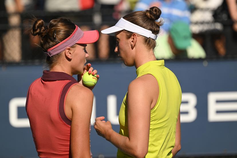 Belgian Elise Mertens (yellow) and Veronika Kudermetova (pink) pictured during a tennis match against US pair Brantmeier-Hamilton, in the second round of the women's doubles of the 2025 US Open Grand Slam tennis tournament in New York City, USA, Saturday 30 August 2025. BELGA PHOTO TONY BEHAR