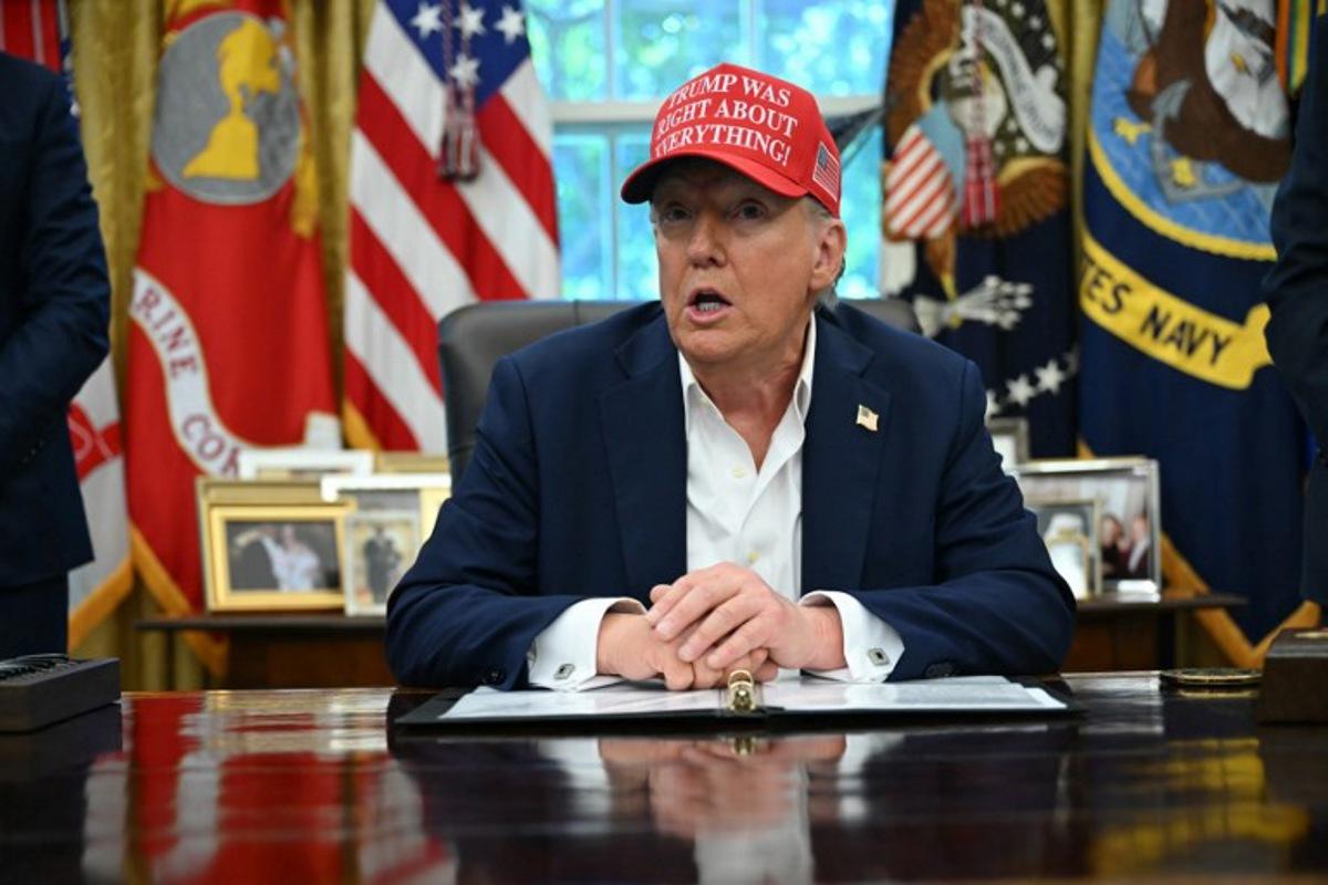 US President Donald Trump makes an announcement from the Oval Office of the White House in Washington, DC, on August 22, 2025. Trump says the 2026 World Cup draw will be held on December 5 at Washington's Kennedy Center. ANDREW CABALLERO-REYNOLDS / AFP