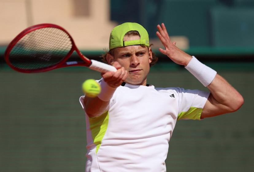 Belgium's Zizou Bergs plays a forehand return to Germany's Alexander Zverev during their Monte Carlo ATP Masters Series Tournament round of 16 tennis match on Court Rainier III at the Monte-Carlo Country Club in Roquebrune-Cap-Martin, south-eastern France on April 9, 2026.  Valery HACHE / AFP