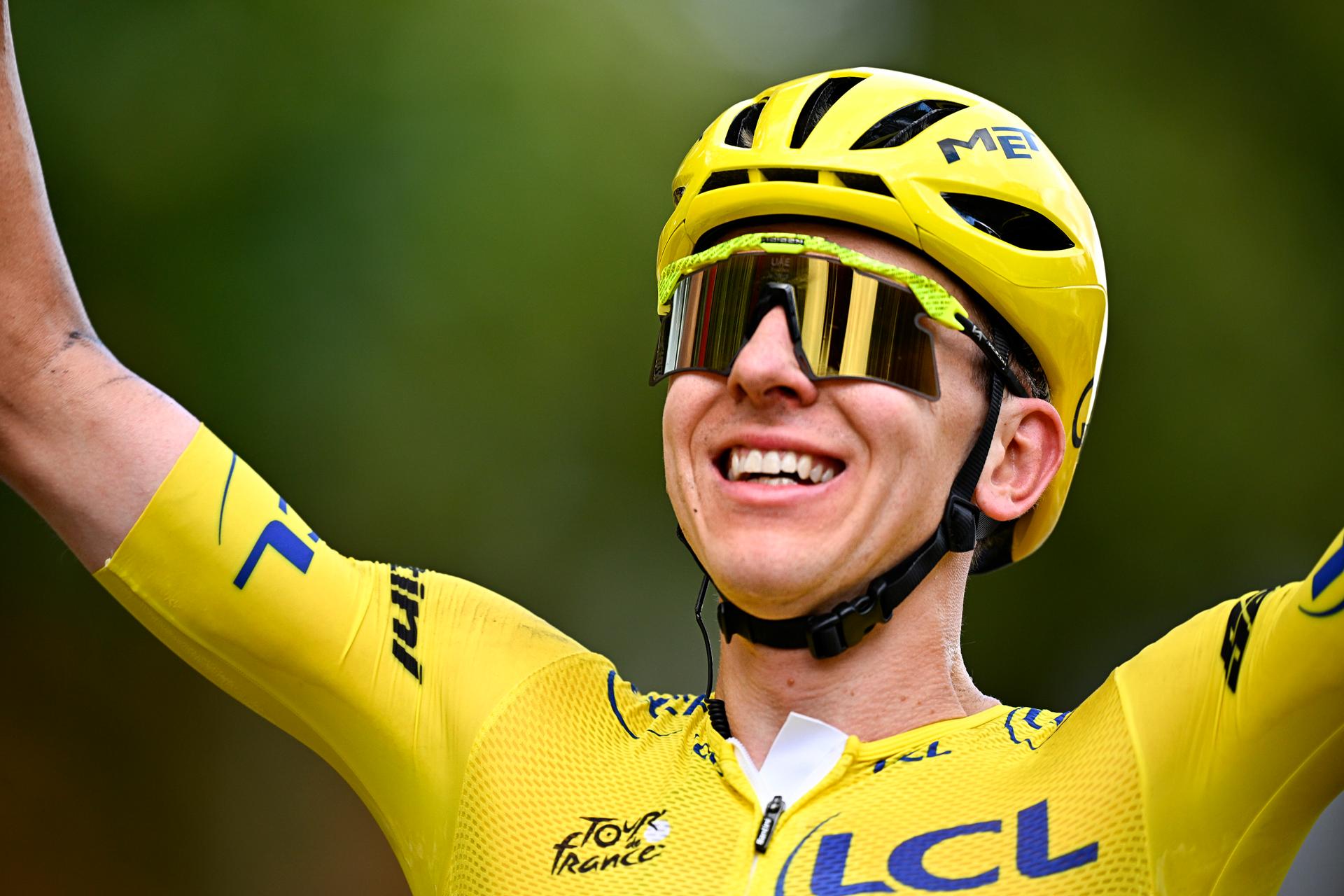 Slovenian Tadej Pogacar of UAE Team Emirates-XRG celebrates as he crosses the finish line of stage 21 of the 2026 Tour de France cycling race, a stage of 130km from Thoiry to Paris Champs-Elysees , on Sunday 26 July 2026. The 113th edition of the Tour de France starts on Saturday 4 July in Barcelona, Spain, and will finish in Paris, France on the 26th of July. BELGA PHOTO JASPER JACOBS