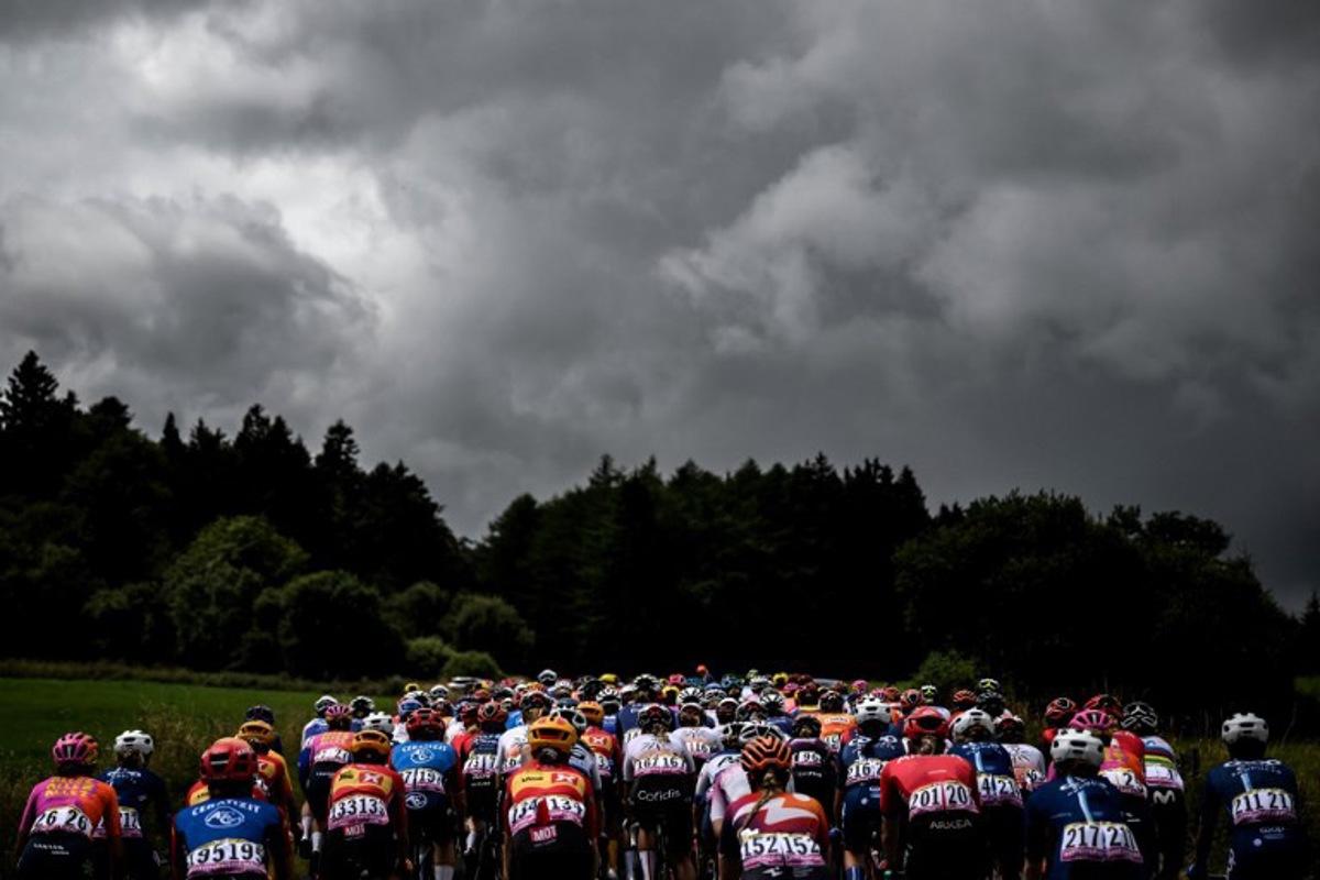 The pack rides during the second stage (out of 8) of the second edition of the Women's Tour de France cycling race 151 km between Clermont-Ferrand and Mauriac, in the Auvergne-Rhone-Alpes region, south-eastern France, on July 24, 2023.  JEFF PACHOUD / AFP