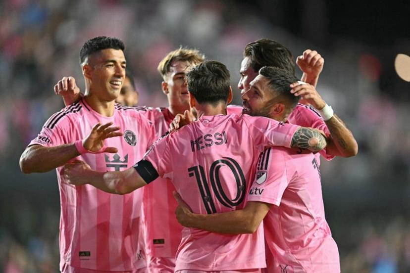 Inter Miami's Argentine forward #10 Lionel Messi celebrates scoring his team's third goal with teammates during the Major League Soccer (MLS) playoff football match between Inter Miami and Nashville SC at Chase Stadium in Fort Lauderdale, Florida on October 24, 2025.  Chandan Khanna / AFP