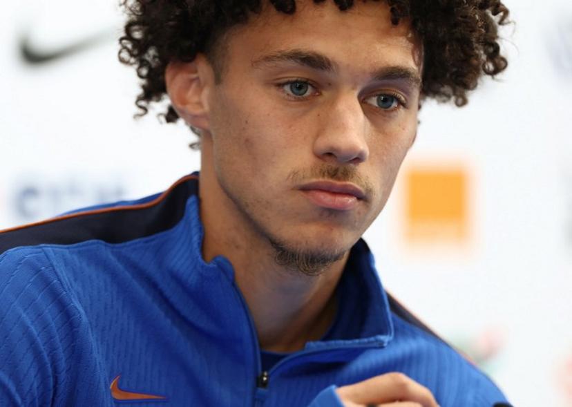 France's forward #25 Maghnes Akliouche gestures during a press conference at Bentley University in Waltham, near Boston, on June 18, 2026, during the 2026 World Cup football tournament.  FRANCK FIFE / AFP