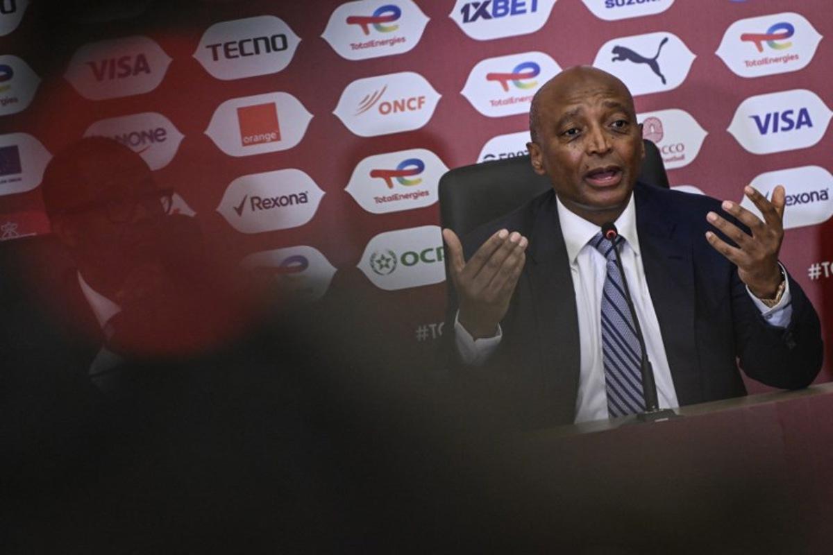 Confederation of African Football President Patrice Motsepe speaks during a press conference at Prince Moulay Abdellah Stadium in Rabat, Morocco on December 20, 2025, ahead of the start of the Africa Cup of Nations (CAN) football tournament. Morooco take on Comoros in the opening game on December 21. SEBASTIEN BOZON / AFP