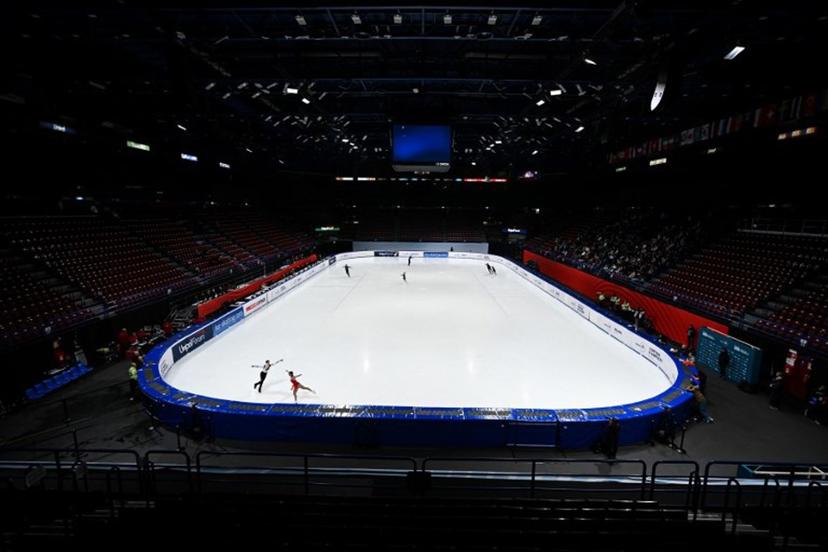 Athletes warm up before the Pair Skating - Free Skating program at the Milano Ice Skating arena (Unipol Forum) in Milan during the Skating - Road to 26 Trophy event, a Milano Cortina 2026 Winter Olympic Games test event, on February 20, 2025.  Piero CRUCIATTI / AFP
