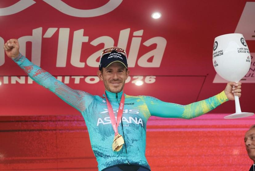 XDS Astana Team Italian rider Davide Ballerini celebrates on the podium after winning the 6th stage of the Giro d'Italia 2026 - Tour of Italy cycling race between Paestum and Naples, southern Italy on May 14, 2026.  Luca Bettini / AFP