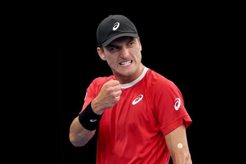 Belgium's Raphael Collignon reacts after winning a point against Australia's Alex de Minaur during their Davis Cup second-round qualifier tennis match at Ken Rosewall Arena in Sydney on September 13, 2025.   DAVID GRAY / AFP