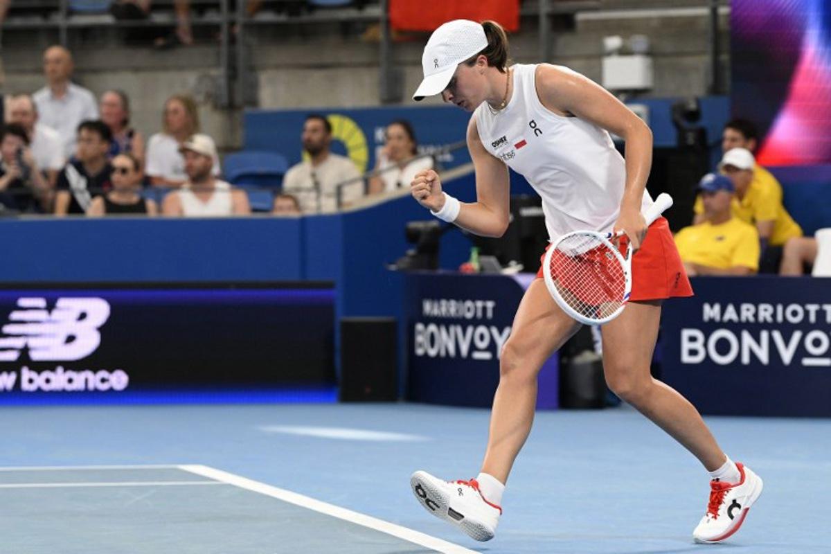Poland's Iga Swiatek reacts on a point against Australia's Maya Joint during their women's singles quarter-final match at the United Cup at Ken Rosewall Arena in Sydney on January 9, 2026.  Izhar KHAN / AFP