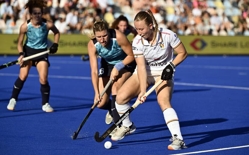 Great Britain's Lily Owsley and Belgium's Charlotte Englebert pictured in action during a hockey game between England and the Belgian national team Red Panthers, match 2/3 in the pool stage of the 2025 women's European championships, Monday 11 August 2025 in Monchengladbach, Germany. BELGA PHOTO ERIC LALMAND