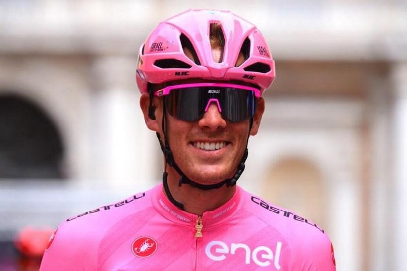 Team Israel Start-Up Nation rider Italy's Alessandro De Marchi, wearing the overall leader's pink jersey, smiles at the start of the fifth stage of the Giro d'Italia 2021 cycling race, 177 km between Modena and Cattolica, Emilia-Romagna, on May 12, 2021.   Dario BELINGHERI / AFP