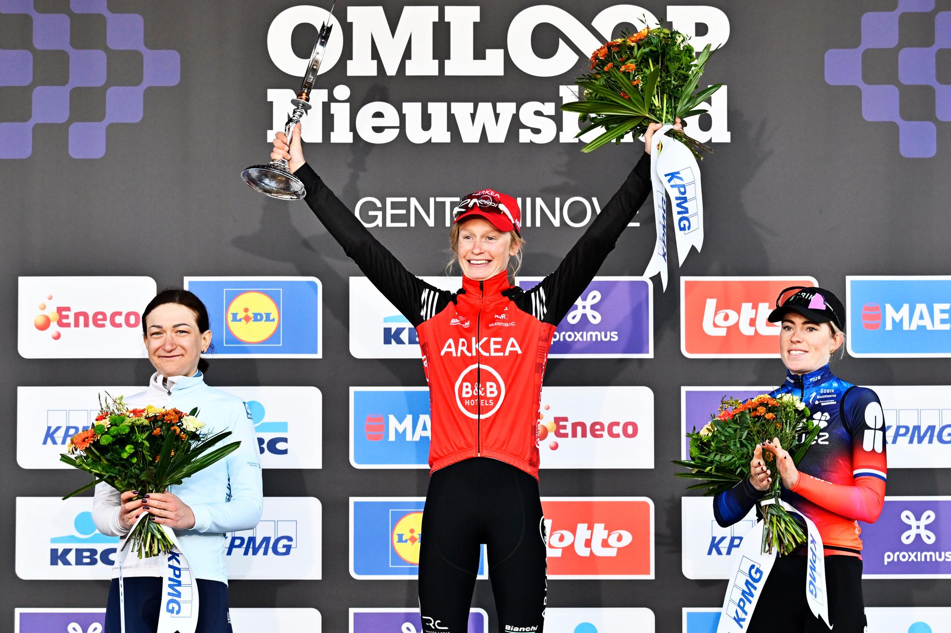Polish Aurela Nerlo of Winspace Orange Seal, Belgian Lotte Claes of Arkea - B&B Hotels Women and Dutch Demi Vollering of FDJ-Suez celebrate on the podium of the women's one-day cycling race Omloop Het Nieuwsblad (UCI World Tour), 137,9km from Gent to Ninove, Saturday 01 March 2025. BELGA PHOTO DIRK WAEM