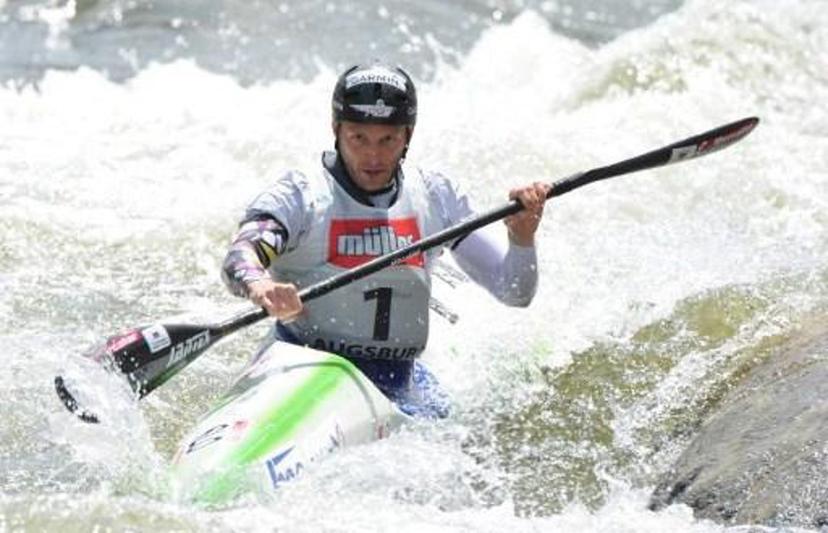 Slovenian Nejc Znidarcic competes in the Kayak K1 men race at the ICF Wildwater Canoeing Sprint World Championships in Augsburg, southern Germany, on June 12, 2011. Znidarcic won the competition ahead of Czech Kamil Mruzek (2nd) and French Remi Pete (3rd). AFP PHOTO/CHRISTOF STACHE