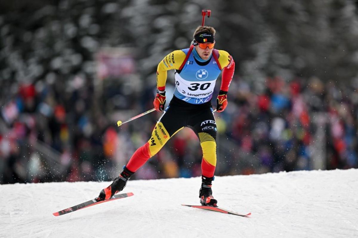 Belgium's Florent Claude competes in the men 10km sprint event of the IBU Biathlon World Cup in Lenzerheide, eastern Switzerland, on December 15, 2023.  Fabrice COFFRINI / AFP