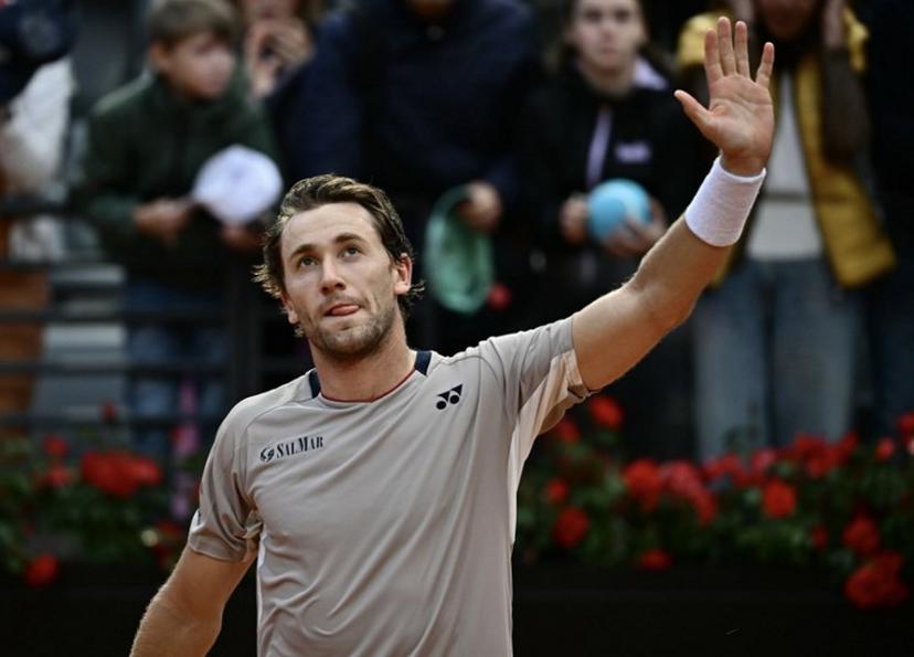 Norway's Casper Ruud celebrates after winning against Russia's Karen Khachanov during the ATP Rome Open tennis tournament at Foro Italico in Rome on May 13, 2026.   Filippo MONTEFORTE / AFP