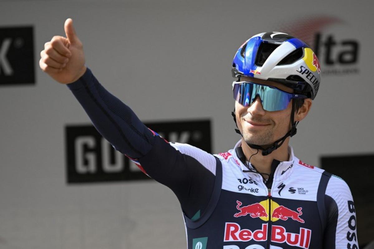 Team Bora's Slovenian Primoz Roglic gives a thumb up on the podium prior the start of the first stage of the 2025 Volta a Catalonya cycling tour of Catalonya, a 178,3 km loop starting and finishing in Sant Feliu de Guixols, on March 24, 2025.  Josep LAGO / AFP