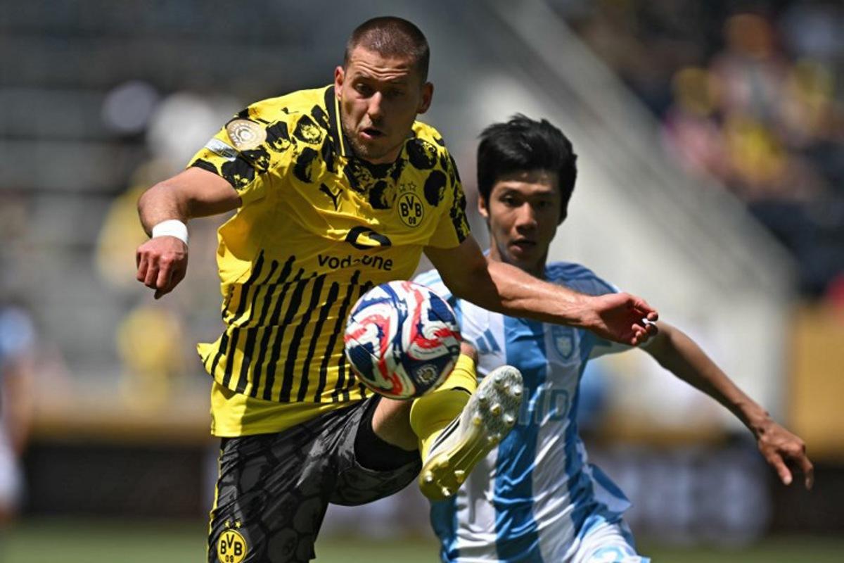 Borussia Dortmund's German defender #03 Waldemar Anton controls the ball during the FIFA Club World Cup 2025 Group F football match between Germany's Borussia Dortmund and South Korea's Ulsan HD at the TQL stadium in Cincinnati on June 25, 2025.  Paul ELLIS / AFP