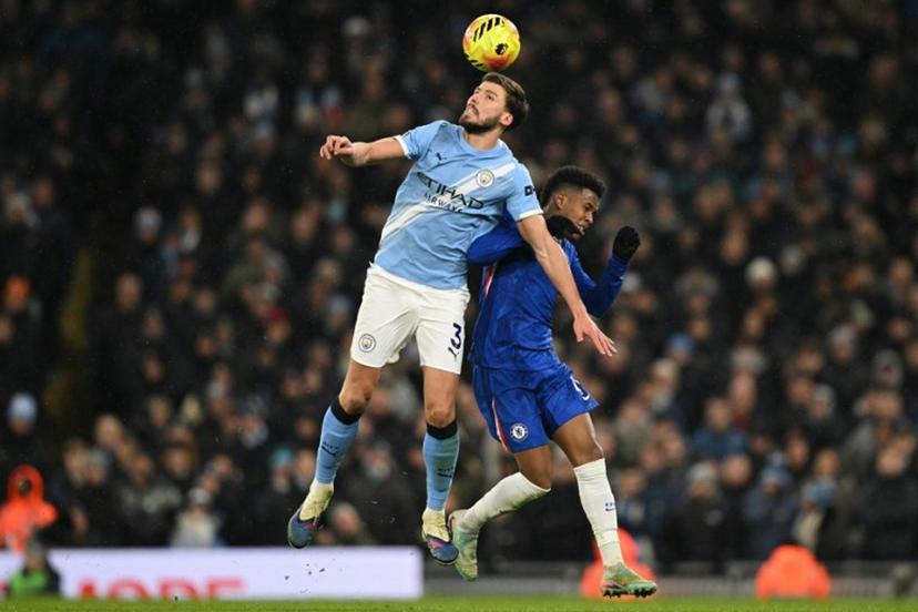 Manchester City's Portuguese defender #03 Ruben Dias (L) vies with Chelsea's Brazilian midfielder #41 Estevao (R) during the English Premier League football match between Manchester City and Chelsea at the Etihad Stadium in Manchester, north west England, on January 4, 2026.  Oli SCARFF / AFP