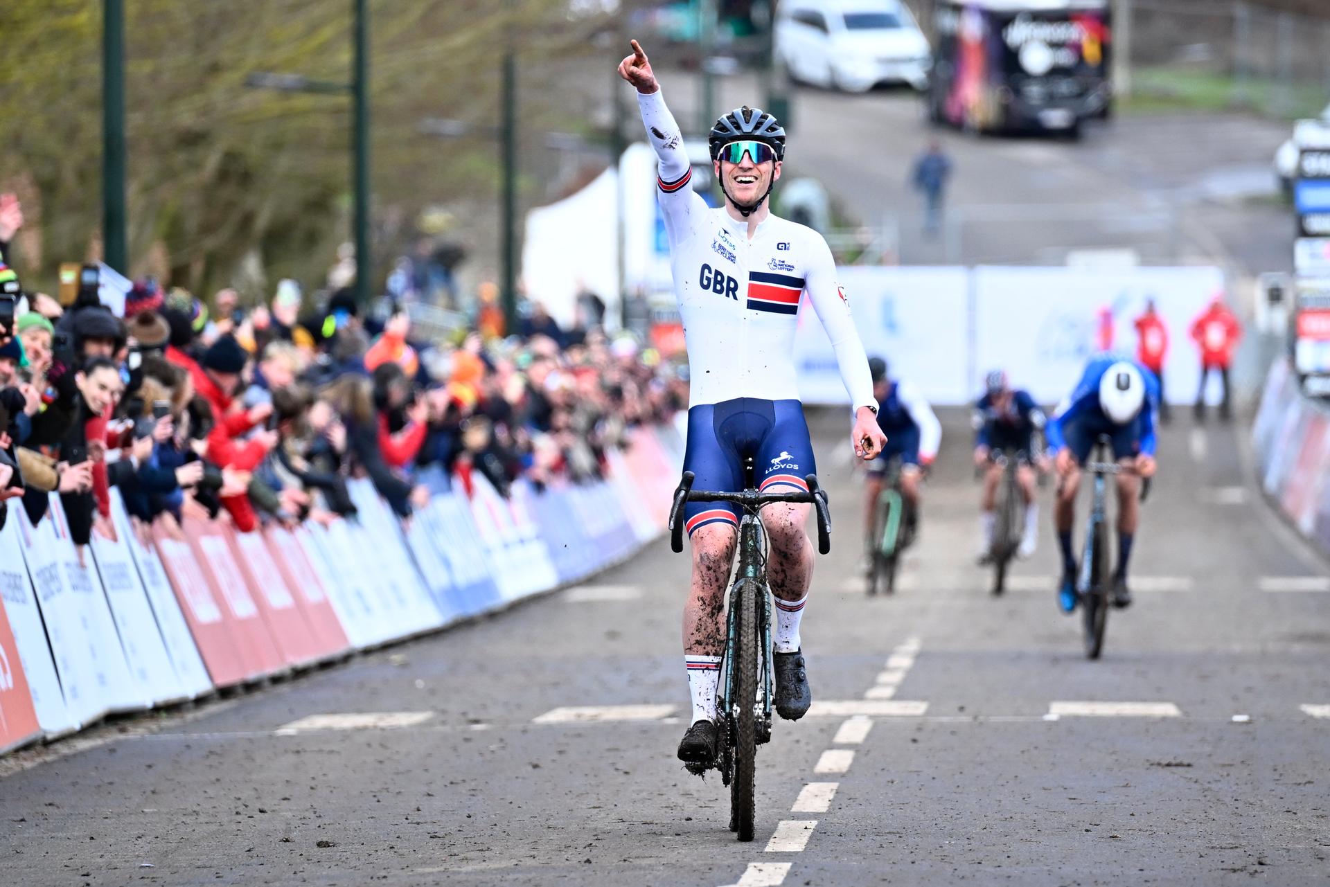 British Thomas Mein celebrates as he crosses the finish line at the mixed team relay race, at the UCI Cyclocross World Championships, in Lievin, France, Friday 31 January 2025. The world championships are taking place from 31 January until 02 February. BELGA PHOTO JASPER JACOBS