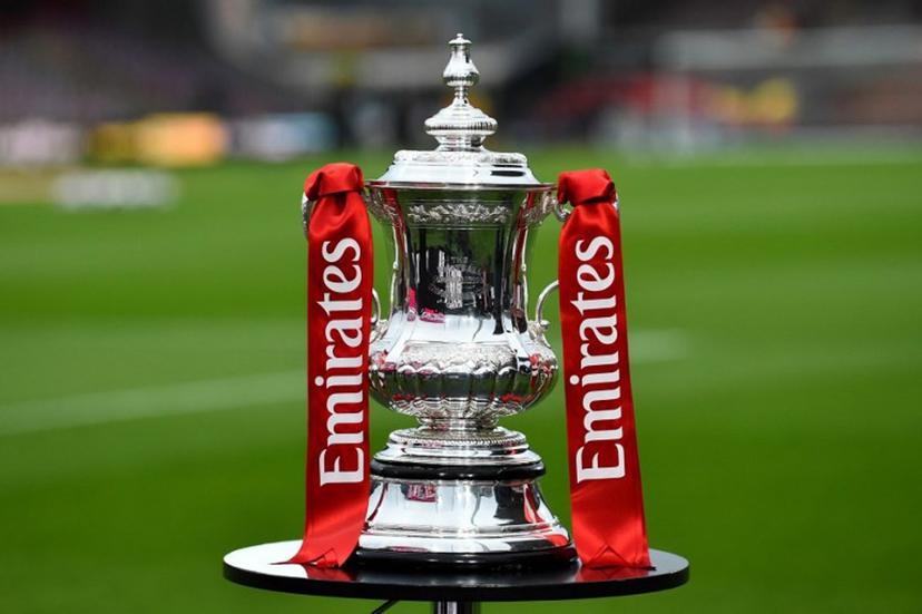 The FA Cup Trophy is displayed before the English FA Cup fifth round football match between Wrexham and Chelsea at the Racecourse Ground Stadium in Wrexham, north Wales, on March 7, 2026.  PETER POWELL / AFP