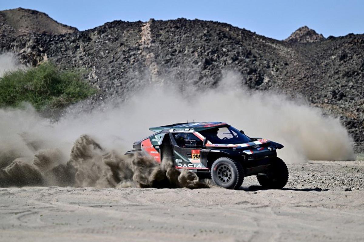 Dacia Sandriders Qatari driver Nasser al-Attiyah assisted by Belgian co-driver Fabian Lurquin compete in the prologue, which determines the starting line-up for the first stage of the 48th edition of the Dakar Rally 2026, between Yanbu and Yanbu, Saudi Arabia, on January 3, 2026.  Giuseppe CACACE / AFP