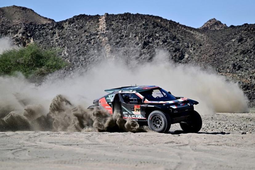 Dacia Sandriders Qatari driver Nasser al-Attiyah assisted by Belgian co-driver Fabian Lurquin compete in the prologue, which determines the starting line-up for the first stage of the 48th edition of the Dakar Rally 2026, between Yanbu and Yanbu, Saudi Arabia, on January 3, 2026.  Giuseppe CACACE / AFP