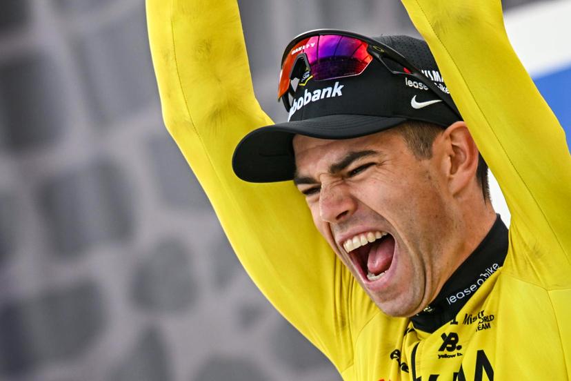 Belgian Wout van Aert of Team Visma-Lease a Bike celebrates on the podium after winning the men's Paris-Roubaix cycling race, Sunday 12 April 2026, around Roubaix, France. The 123rd edition of Paris-Roubaix cycling races will take on Sunday, with the women riding 143,1 km the men riding 258,3 km on Sunday. BELGA PHOTO JASPER JACOBS