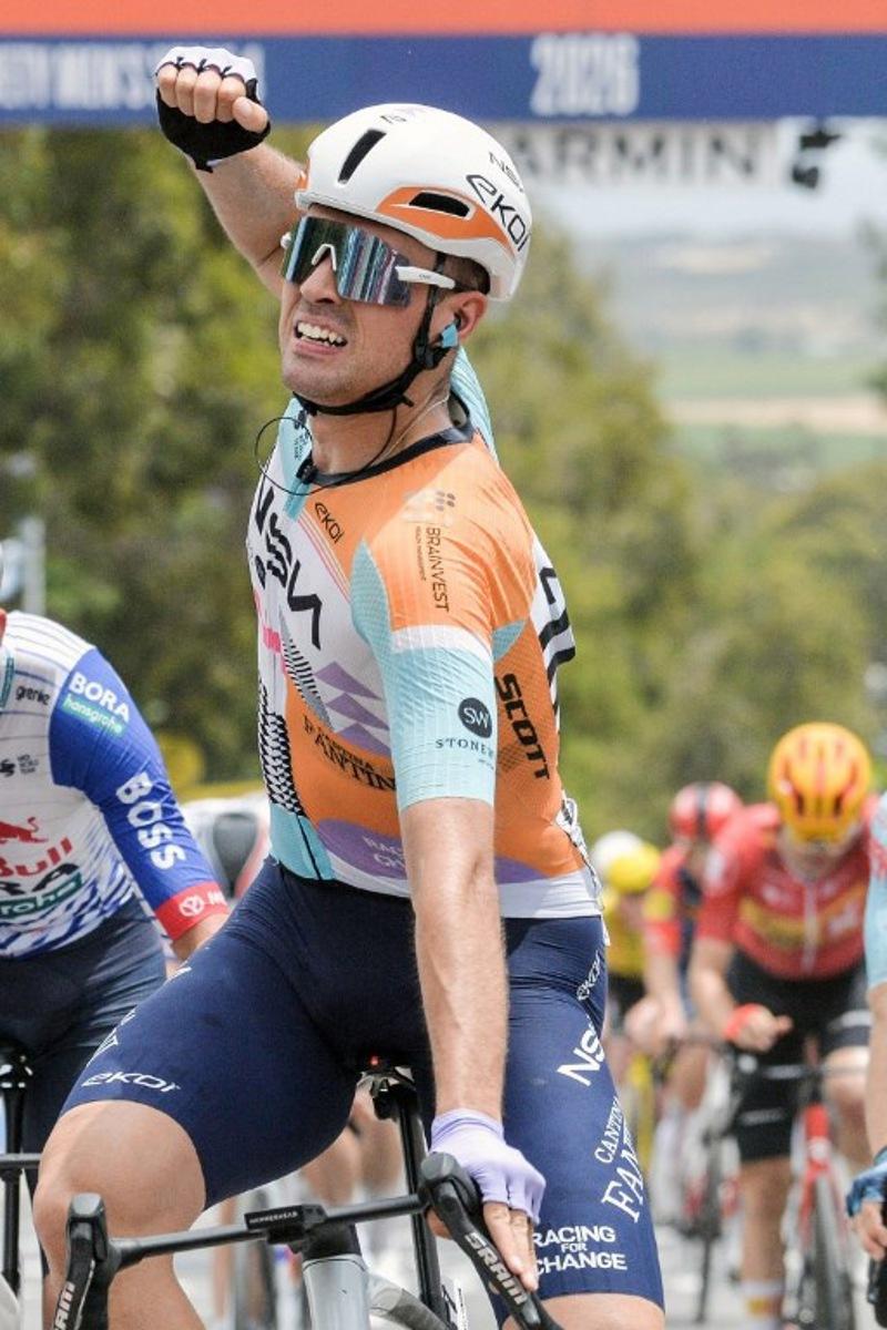 NSN Cycling Team's British rider Ethan Vernon crosses the finish line to win stage four of the Tour Down Under UCI men's cycling race in Adelaide on January 24, 2026.   Brenton Edwards / AFP