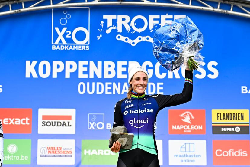 Dutch Lucinda Brand celebrates on the podium after winning the women elite race of the Koppenbergcross, the first race (out of eight) of the X2O Badkamers trophy cyclocross competition, in Melden, Oudenaarde, on Saturday 01 November 2025. BELGA PHOTO JASPER JACOBS