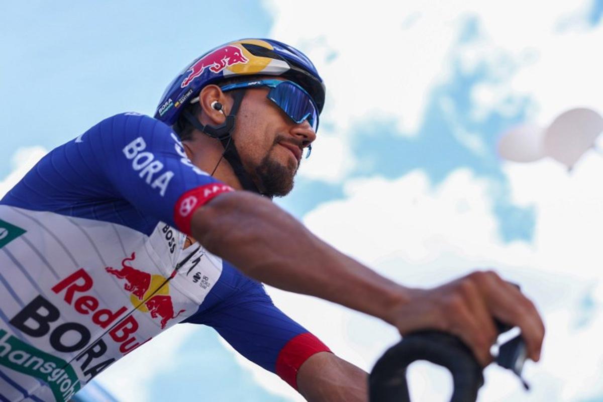 Red Bull - Bora - Hansgrohe's Colombian rider Daniel Felipe Martinez Poveda reacts ahead of the start of the 5th stage of the Tour Auvergne-Rhone-Alpes cycling race (formerly known as the Criterium du Dauphine), 195,8km between Saint-Chamond and Villars-les-Dombes, central France, on June 11, 2026.  Anne-Christine POUJOULAT / AFP