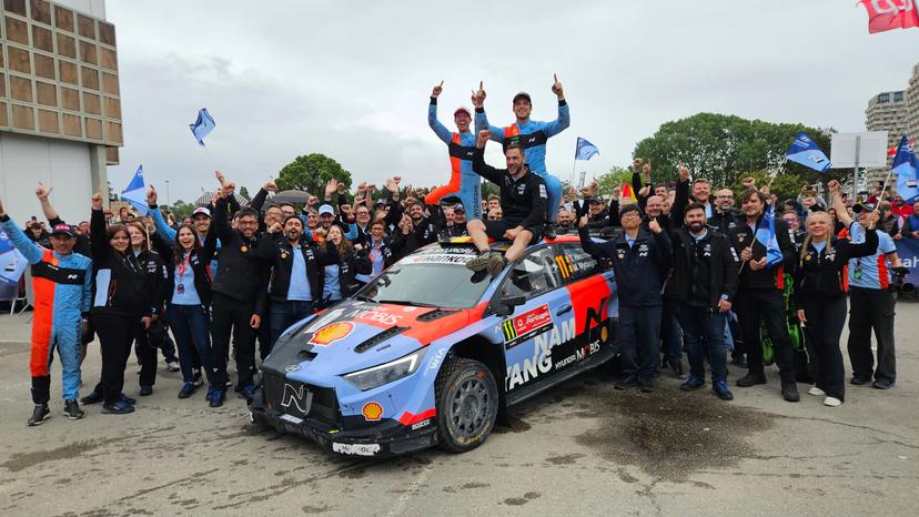 Thierry Neuville (R) and co-pilot Martijn Wydaeghe celebrate on the top of their car with their team after winning the Rally de Portugal event in Baltar, Portugal on Sunday 10 May 2026. BELGA PHOTO ERIC DUPAIN