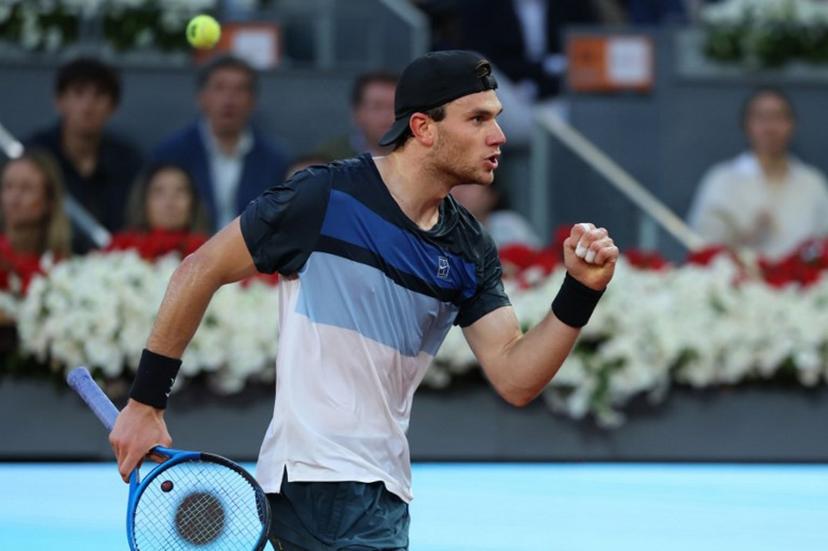 Great Britain's Jack Draper celebrates a point against Italy's Lorenzo Musetti during their 2025 ATP Tour Madrid Open tennis tournament semifinals singles match at the Caja Magica in Madrid, on May 2, 2025.  Thomas COEX / AFP