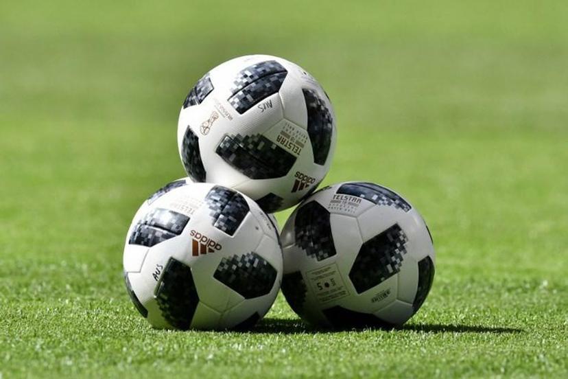Footballs are seen on the pitch for the warm up before the Russia 2018 World Cup Group C football match between Denmark and Australia at the Samara Arena in Samara on June 21, 2018.  Fabrice COFFRINI / AFP RESTRICTED TO EDITORIAL USE - NO MOBILE PUSH ALERTS/DOWNLOADS

