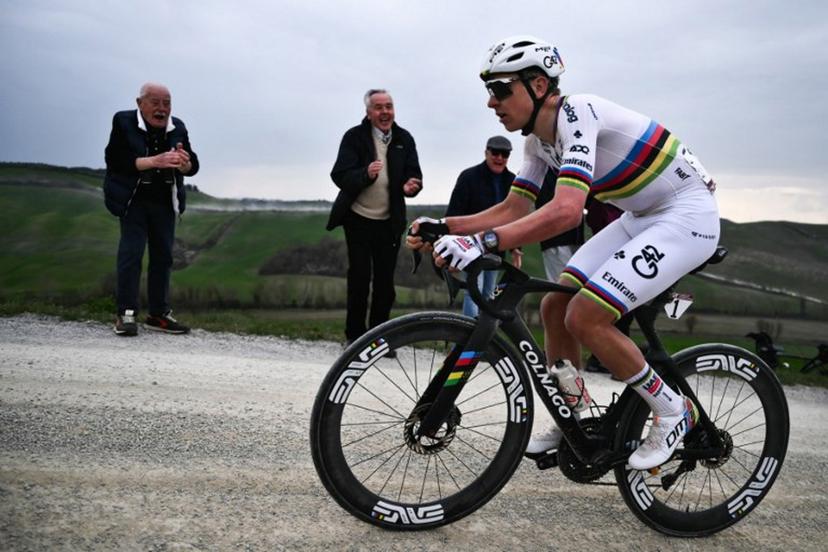 UAE Team Emirates's Slovenian Tadej Pogacar leads during the 20th one-day classic 'Strade Bianche' (White Roads) men's cycling race between Siena and Siena in Tuscany on March 7, 2026.  Marco BERTORELLO / AFP
