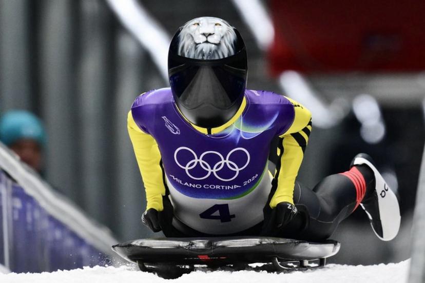 Belgium's Kim Meylemans arrives to the finish area in the skeleton women's heat 3 at Cortina Sliding Centre during the Milano Cortina 2026 Winter Olympic Games in Cortina d'Ampezzo on February 14, 2026.  Stefano RELLANDINI / AFP