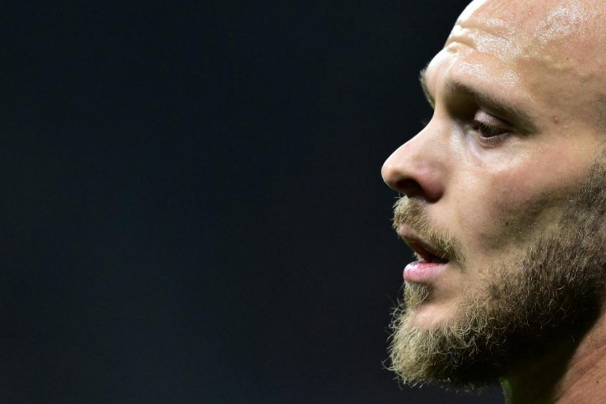 Inter Milan's Italian defender #32 Federico Dimarco reacts during the Italian Serie A football match between AC Milan and Inter Milan at the San Siro Stadium in Milan, northern Italy, on March 8, 2026.  Stefano RELLANDINI / AFP