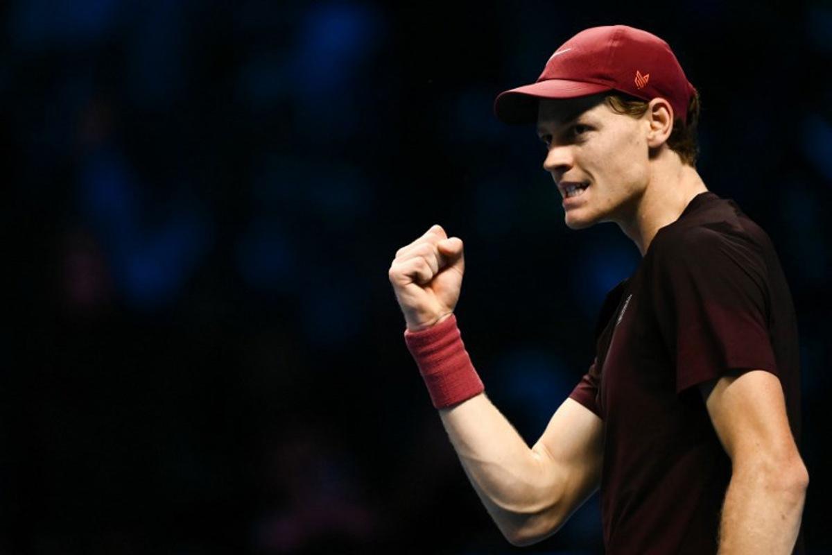 Italy's Jannik Sinner reacts during the men's single final match against Spain's Carlos Alcaraz at the ATP Finals tennis tournament, in Turin, on November 16, 2025.  Marco BERTORELLO / AFP