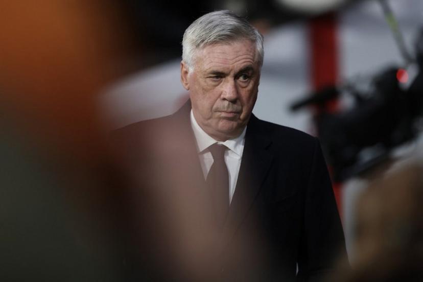 Real Madrid's Italian coach Carlo Ancelotti looks on during the UEFA Champions League Round of 16 second leg football match between Club Atletico de Madrid and Real Madrid CF at the Metropolitano stadium in Madrid on March 12, 2025.  Thomas COEX / AFP