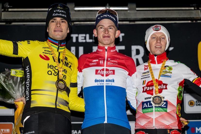 Belgian Wout van Aert, Dutch Tibor Del Grosso and Belgian Michael Vanthourenhout pictured on the podium after the men elite race at the cyclocross cycling event in Heusden-Zolder, stage 5/8 in the Superprestige competition, Tuesday 23 December 2025. BELGA PHOTO DAVID PINTENS