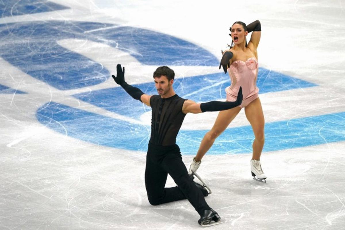 France's Laurence Fournier Beaudry and Guillaume Cizeron perform during the Ice Dance Rhythm Dance discipline on day four of the ISU Figure Ice Skating European Championships in Sheffield, northern England on January 16, 2026.  Ian HODGSON / AFP