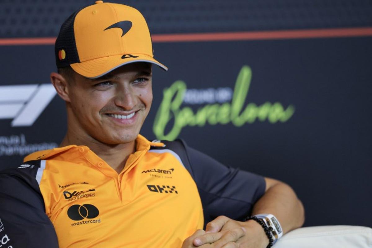 McLaren's British driver Lando Norris smiles during a press confeence on the eve of the Spanish Formula One Grand Prix at the Circuit de Catalunya in Montmelo, on the outskirts of Barcelona, on May 29, 2025.  LLUIS GENE / AFP